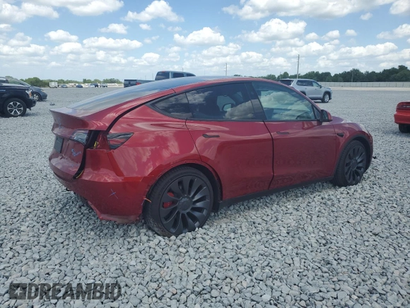 2024 Tesla Model Y Performance with VIN 7SAYGDEF1RF052175, listed as a Copart auction lot 51743895 with 4,869 mi miles and Salvage Title. Bid and sale history available at DreamBid. Image 3.