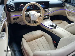 2021 Mercedes-Benz E 450 with VIN W1K1K5JB5MF164686, listed as a Copart auction lot 71977664 with 10,399 mi miles and Salvage title. Bid and sale history available at DreamBid. Image 8.