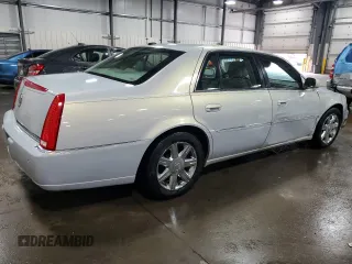 2007 Cadillac DTS Luxury I with VIN 1G6KD57Y47U141388, listed as a Copart auction lot 52374295 with 198,951 mi miles and Salvage Title. Bid and sale history available at DreamBid. Image 3.