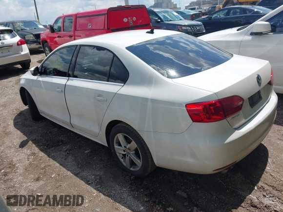 2013 Volkswagen Jetta TDI w/Premium/Nav with VIN 3VWLL7AJ9DM300544, listed as a IAAI auction lot 42401610 with 157,585 mi miles and . Bid and sale history available at DreamBid. Image 3.