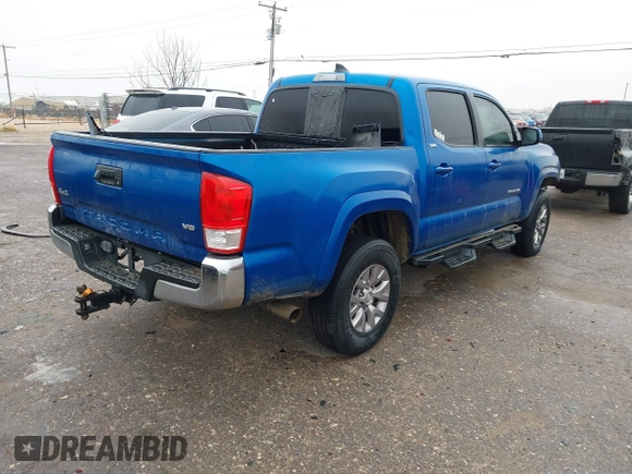 2016 Toyota Tacoma SR with VIN 5TFCZ5AN4GX013233, listed as a IAAI auction lot 41394610 with 142,099 mi miles and . Bid and sale history available at DreamBid. Image 4.