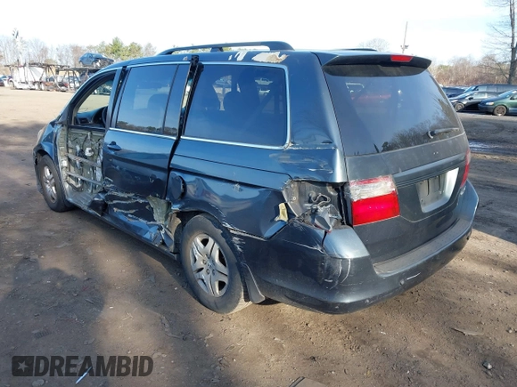 2005 Honda Odyssey EX-L with VIN 5FNRL38615B040637, listed as a IAAI auction lot 41920622 with 92,673 mi miles. Bid and sale history available at carsss.com. Image 3.