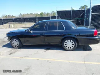 2005 Ford Police Interceptor with VIN 2FAFP71W25X132421, listed as a IAAI auction lot 41813929 with 228,404 mi miles. Bid and sale history available at carsss.com. Image 13.