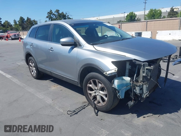 2011 Mazda CX-9 Sport with VIN JM3TB2BVXB0307360, listed as a IAAI auction lot 42580629 with 136,928 mi miles and . Bid and sale history available at DreamBid. Image 1.