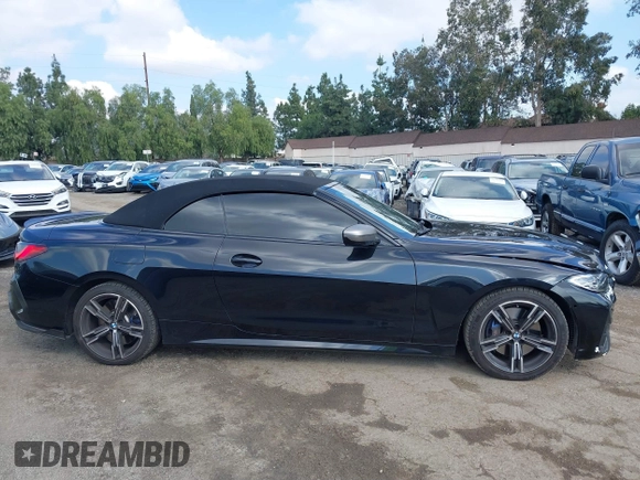 2023 BMW 4 Series M440i with VIN WBA53AT09PCL49954, listed as a IAAI auction lot 41478951 with 27,105 mi miles and . Bid and sale history available at DreamBid. Image 14.