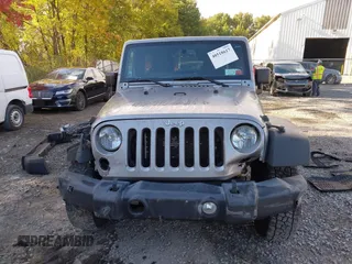 2016 Jeep Wrangler Unlimited Sport with VIN 1C4BJWDG2GL281985, listed as a IAAI auction lot 40518617 with 105,415 mi miles and . Bid and sale history available at DreamBid. Image 12.