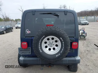 2006 Jeep Wrangler Sport with VIN 1J4FA49S16P737060, listed as a IAAI auction lot 41784197 with 42,030 mi miles. Bid and sale history available at carsss.com. Image 16.