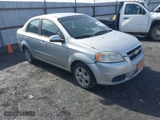 2011 Chevrolet Aveo LT w/1LT with VIN KL1TD5DE8BB218206, listed as a IAAI auction lot 41468978 with 106,997 mi miles. Bid and sale history available at carsss.com. Image 1.