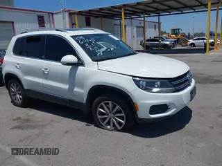 2017 Volkswagen Tiguan Wolfsburg Edition with VIN WVGRV7AX4HW502964, listed as a IAAI auction lot 42538054 with 104,530 mi miles and . Bid and sale history available at DreamBid. Image 1.