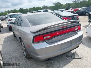 2013 Dodge Charger SE with VIN 2C3CDXBG3DH655523, listed as a IAAI auction lot 42003869 with 172,948 mi miles. Bid and sale history available at carsss.com. Image 3.