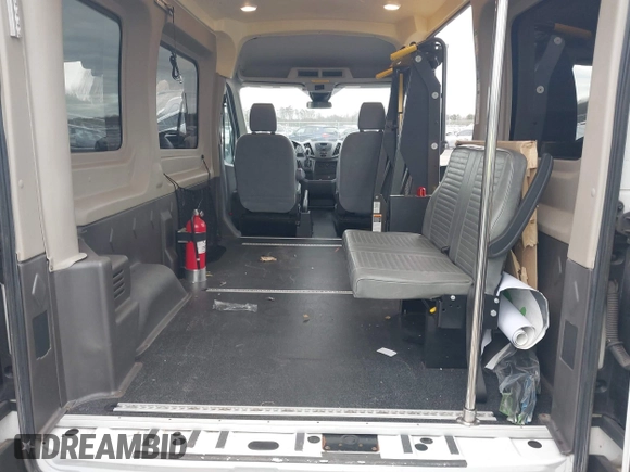 2016 Ford Transit Cargo with VIN 1FTYR1CM5GKA27058, listed as a IAAI auction lot 41753527 with 112,824 mi miles and . Bid and sale history available at DreamBid. Image 19.