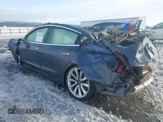 2020 Tesla Model 3 Long Range z VIN 5YJ3E1EB9LF787390, wystawiony jako IAAI lot #41614394 z przebiegiem Nie podano mil oraz . Historia ofert i sprzedaży dostępna na DreamBid. Obrazek 3.