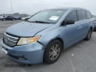 2012 Honda Odyssey EX-L with VIN 5FNRL5H66CB061847, listed as a IAAI auction lot 42162377 with 217,204 mi miles and . Bid and sale history available at DreamBid. Image 17.