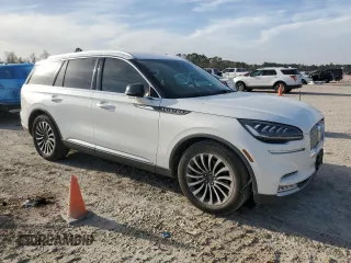 2020 Lincoln Aviator Reserve with VIN 5LM5J7WC1LGL27010, listed as a Copart auction lot 48890555 with 95,874 mi miles and Clean title. Bid and sale history available at DreamBid. Image 4.