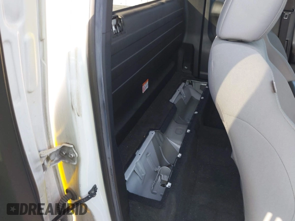 2022 Toyota Tacoma SR with VIN 3TYRX5GNXNT038474, listed as a IAAI auction lot 42090753 with 142,590 mi miles and . Bid and sale history available at DreamBid. Image 8.