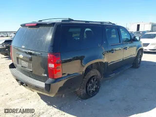 2008 Chevrolet Suburban LT w/3LT with VIN 3GNFC16088G207846, listed as a IAAI auction lot 41483605 with 184,709 mi miles. Bid and sale history available at carsss.com. Image 4.