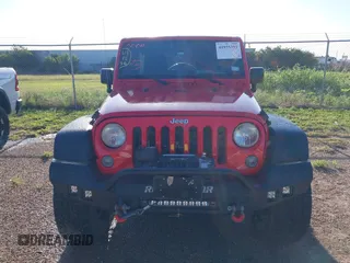 2015 Jeep Wrangler Unlimited Willys Wheeler with VIN 1C4BJWDG0FL635341, listed as a IAAI auction lot 41955393 with 145,529 mi miles and . Bid and sale history available at DreamBid. Image 6.
