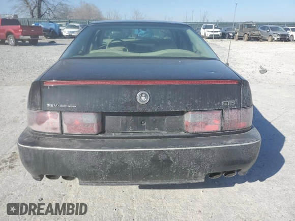 1996 Cadillac Seville Touring STS z VIN 1G6KY5299TU801228, wystawiony jako Copart lot #47304045 z przebiegiem Nie podano mil oraz Szkoda całkowita • Salvage title. Historia ofert i sprzedaży dostępna na DreamBid. Obrazek 6.