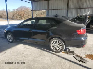 2012 Volkswagen Jetta Sedan SEL w/Sunroof with VIN 3VWLX7AJ2CM304776, listed as a Copart auction lot 86025554 with 103,784 mi miles and Salvage Title. Bid and sale history available at carsss.com. Image 2.