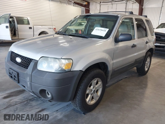 2006 Ford Escape XLT with VIN 1FMCU93126KC12711, listed as a IAAI auction lot 42659618 with 180,611 mi miles and . Bid and sale history available at DreamBid. Image 2.