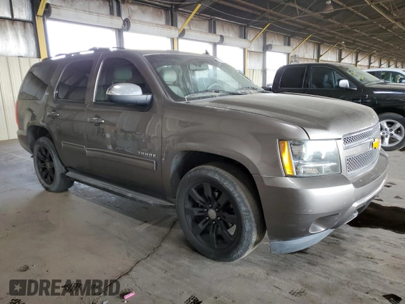2014 Chevrolet Tahoe LT with VIN 1GNSCBE06ER245772, listed as a Copart auction lot 53747375 with 221,139 mi miles and Salvage title. Bid and sale history available at DreamBid. Image 4.