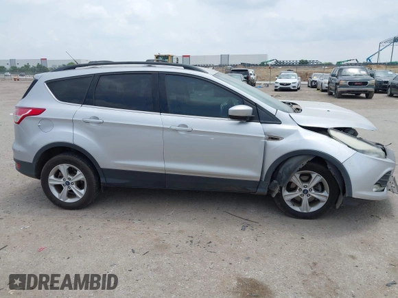 2013 Ford Escape SE with VIN 1FMCU0GX9DUD68711, listed as a IAAI auction lot 42243521 with 120,441 mi miles and . Bid and sale history available at DreamBid. Image 13.