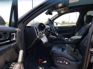 2021 Porsche Cayenne Turbo S E-Hybrid with VIN WP1AA2AY1MDA08476, listed as a IAAI auction lot 42382064 with 52,663 mi miles and . Bid and sale history available at DreamBid. Image 5.