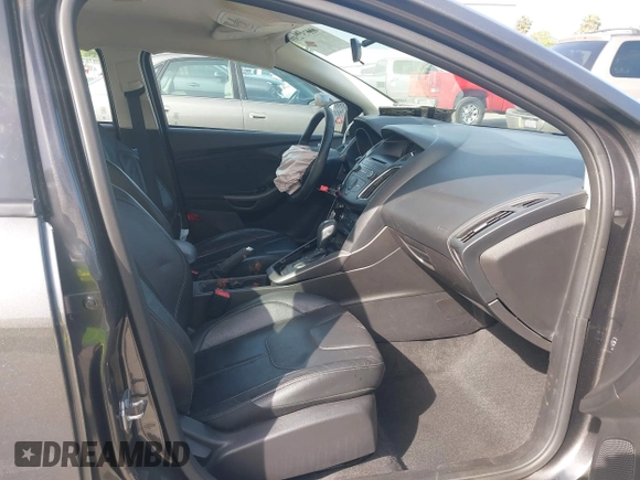 2015 Ford Focus SE with VIN 1FADP3F25FL348929, listed as a IAAI auction lot 42275725 with 99,668 mi miles and . Bid and sale history available at DreamBid. Image 5.