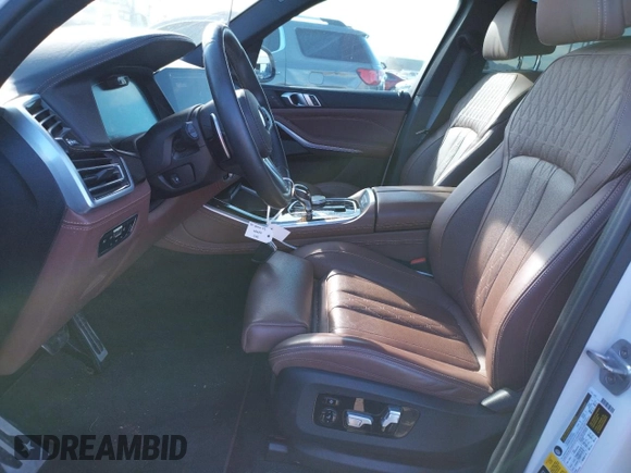 2020 BMW X5 M50i with VIN 5UXJU4C00L9B77869, listed as a Copart auction lot 36123043 with 27,195 mi miles. Bid and sale history available at carsss.com. Image 7.