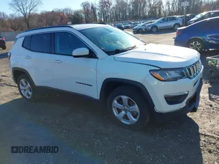 2020 Jeep Compass Latitude with VIN 3C4NJDBB2LT115599, listed as a IAAI auction lot 40970548 with 63,349 mi miles. Bid and sale history available at carsss.com. Image 1.