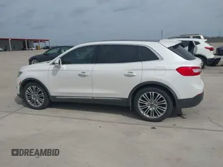 2016 Lincoln MKX Reserve with VIN 2LMPJ6LP8GBL33580, listed as a IAAI auction lot 41749632 with 100,579 mi miles. Bid and sale history available at carsss.com. Image 14.