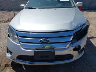 2012 Ford Fusion SEL z VIN 3FAHP0JGXCR422667, wystawiony jako IAAI lot #42226602 z przebiegiem 181 237 mil mil oraz . Historia ofert i sprzedaży dostępna na DreamBid. Obrazek 6.