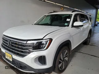 2024 Volkswagen Atlas SE with VIN 1V2HR2CA2RC556331, listed as a IAAI auction lot 42806429 with 25,239 mi miles and . Bid and sale history available at DreamBid. Image 4.