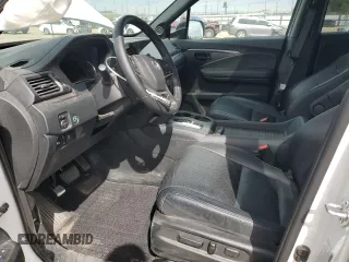 2023 Honda Passport EX-L z VIN 5FNYF8H56PB023651, wystawiony jako Copart lot #51015165 z przebiegiem 24 144 mil mil oraz Szkody całkowita. Historia ofert i sprzedaży dostępna na DreamBid. Obrazek 7.
