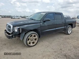 2005 Dodge Dakota ST z VIN 1D7HE28K35S235225, wystawiony jako Copart lot #57684725 z przebiegiem 184 546 mil mil oraz Szkoda całkowita • Salvage title. Historia ofert i sprzedaży dostępna na DreamBid. Obrazek 1.