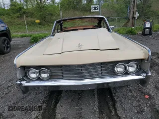1965 Lincoln Continental z VIN 5Y86N428483, wystawiony jako Copart lot #56333345 z przebiegiem Nie podano mil oraz Szkoda całkowita • Salvage title. Historia ofert i sprzedaży dostępna na DreamBid. Obrazek 5.