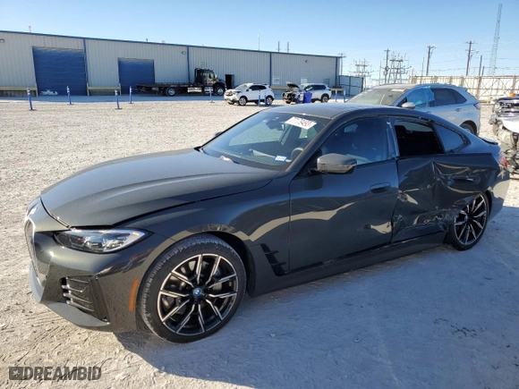 2023 BMW i4 eDrive40 with VIN WBY73AW09PFN91308, listed as a Copart auction lot 77179493 with 4,301 mi miles. Bid and sale history available at carsss.com. Image 1.