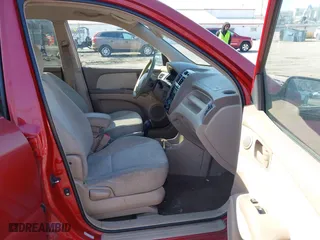 2007 Kia Sportage LX with VIN KNDJF724477445886, listed as a IAAI auction lot 41778532 with 253,979 mi miles. Bid and sale history available at carsss.com. Image 5.