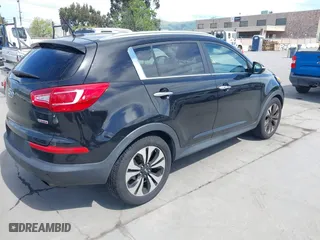 2011 Kia Sportage SX with VIN KNDPC3A69B7149771, listed as a IAAI auction lot 42012102 with 125,157 mi miles. Bid and sale history available at carsss.com. Image 4.