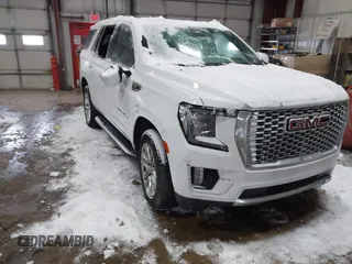 2023 GMC Yukon Denali with VIN 1GKS2DKL5PR266660, listed as a IAAI auction lot 41618299 with 53,440 mi miles. Bid and sale history available at carsss.com. Image 1.