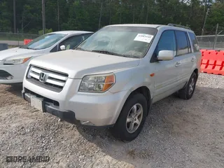 2006 Honda Pilot EX-L with VIN 5FNYF28506B005092, listed as a IAAI auction lot 42083249 with 199,361 mi miles. Bid and sale history available at carsss.com. Image 2.