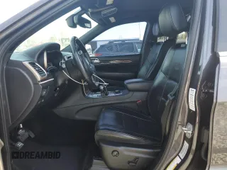 2015 Jeep Grand Cherokee Overland with VIN 1C4RJFCMXFC237723, listed as a Copart auction lot 50318145 with 103,741 mi miles and Salvage title. Bid and sale history available at DreamBid. Image 7.