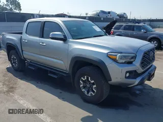 2020 Toyota Tacoma SR5 with VIN 3TMAZ5CN7LM138859, listed as a IAAI auction lot 42150725 with 36,462 mi miles and . Bid and sale history available at DreamBid. Image 1.