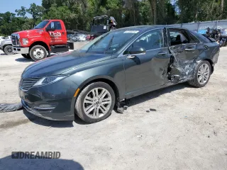 2016 Lincoln MKZ z VIN 3LN6L2G95GR606837, wystawiony jako Copart lot #57356815 z przebiegiem 67 898 mil mil oraz Szkoda całkowita • Salvage title. Historia ofert i sprzedaży dostępna na DreamBid. Obrazek 1.