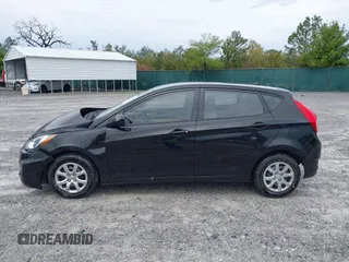 2014 Hyundai Accent GS with VIN KMHCT5AE7EU164658, listed as a IAAI auction lot 41911092 with 132,442 mi miles. Bid and sale history available at carsss.com. Image 14.