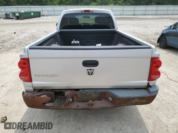 2006 Dodge Dakota ST z VIN 1D7HE22K56S580539, wystawiony jako Copart lot #60862435 z przebiegiem 159 804 mil mil oraz Czysty tytuł • Clean title. Historia ofert i sprzedaży dostępna na DreamBid. Obrazek 6.