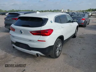 2020 BMW X2 sDrive28i with VIN WBXYH9C07L5P35810, listed as a IAAI auction lot 42043222 with 101,329 mi miles and . Bid and sale history available at DreamBid. Image 4.