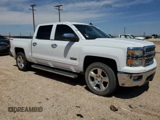 2015 Chevrolet Silverado 1500 LT with VIN 3GCUKREC8FG321629, listed as a Copart auction lot 54974495 with 194,766 mi miles and Salvage Title. Bid and sale history available at DreamBid. Image 4.