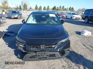 2022 Honda Civic LX z VIN 2HGFE2F29NH580563, wystawiony jako IAAI lot #41861920 z przebiegiem 15 559 mil mil oraz . Historia ofert i sprzedaży dostępna na DreamBid. Obrazek 13.