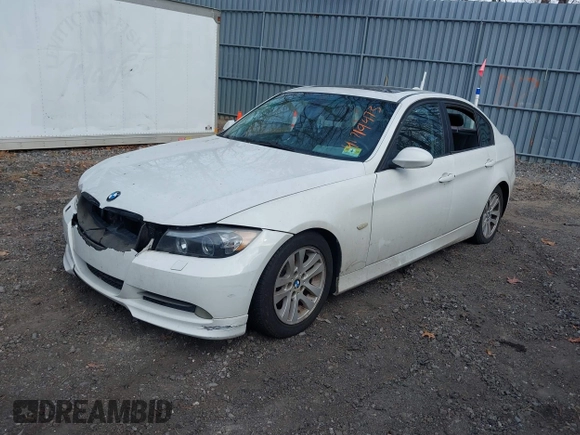 2007 BMW 3 Series 328xi with VIN WBAVC93577KX53139, listed as a IAAI auction lot 41719473 with 155,716 mi miles. Bid and sale history available at carsss.com. Image 2.
